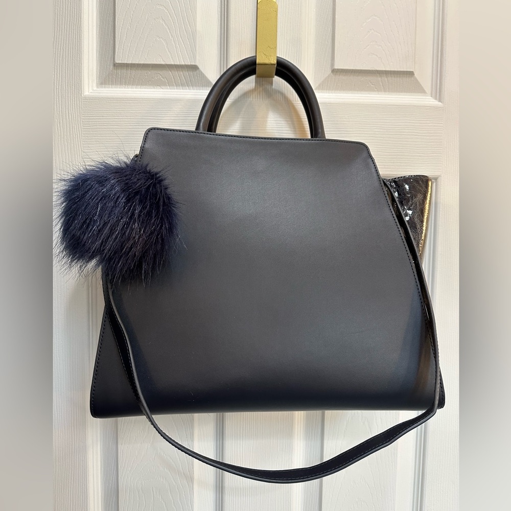 ZAC Posen navy satchel with detachable shoulder strap.